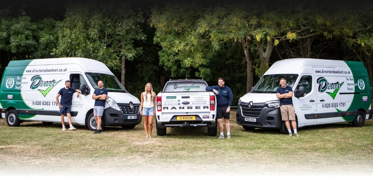 The Direct Windows team with their vans